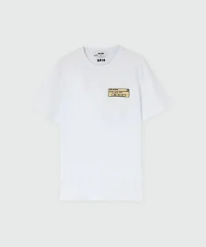 White long-sleeve cotton jersey T-shirt with patch on the chest.