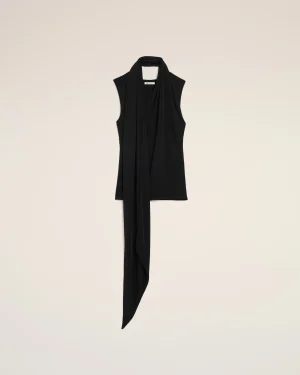 Black sleeveless top with a long scarf draped around the neck, hanging down the front against a beige background.
