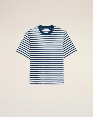 Blue and white striped short-sleeve T-shirt on a beige background, with a small heart embroidery on the chest area.
