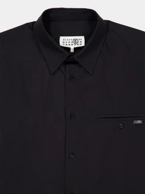 Black button-down shirt with a pointed collar, front placket, and a small chest pocket with a brand tag visible on the right side.