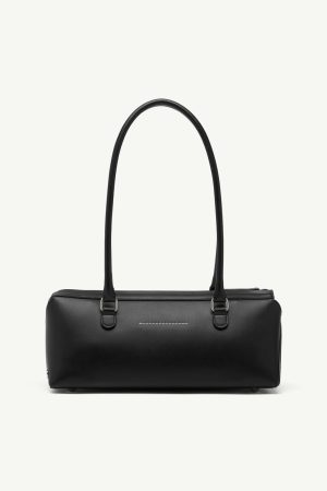 Black leather handbag with two top handles and minimal stitching, shown from the front.