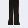 Black tailored dress pants with belt loops and a straight-leg silhouette on a light background.