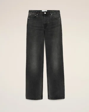 Front view of black denim jeans on a light background, showing 5-pocket design and button closure at the waist