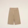 Beige-brown wide-leg pants cropped at the waist against a light neutral background