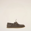 Brown suede boat shoe with white stitching and light tan sole, hanging against a pale background.