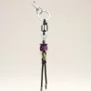 IMG_0940 - New Trend Silver keyring with a black leather cord and colorful beads hanging below (purple and lime).