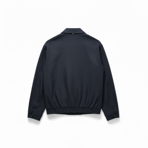 Back view of a dark navy bomber jacket with elastic hem and cuff buttons at the wrists.