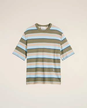 Striped crew-neck T-shirt in olive, light blue, peach and navy on a beige background, shown from the chest up.