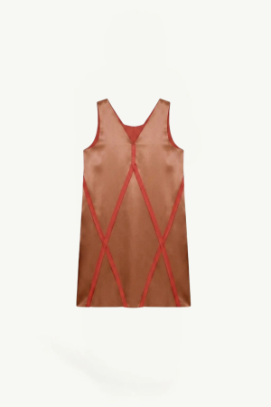 Sleeveless copper-brown dress with red diagonal panels forming a geometric pattern down the front/top area.