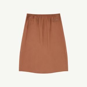 Brown-orange skirt with an elastic waistband visible at the top center of the image
