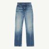 IMG_1249 - New Trend Pair of blue denim jeans with light fading and small rips, front view on a white background.