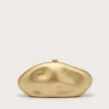 IMG_1262 - New Trend Gold-toned, abstract organic sculpture on a light beige background with soft shadows.