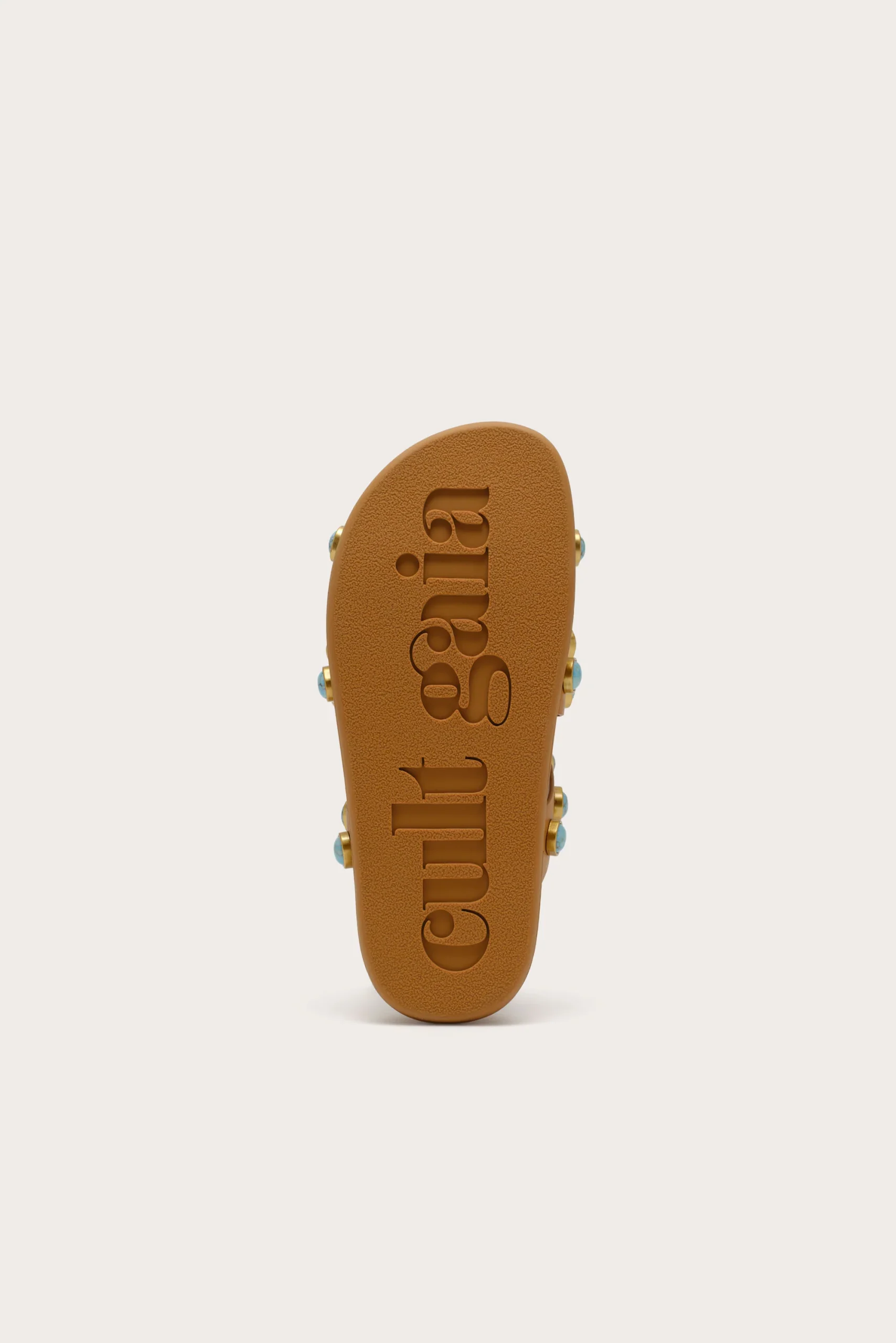 IMG_1270 - New Trend Top-down view of a brown slide sandal with embossed lettering along the footbed in the center