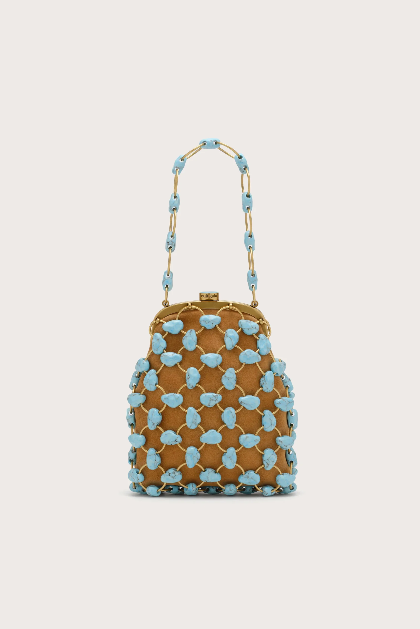 IMG_1443 - New Trend Beige background with a brown beaded handbag covered in turquoise stones and a matching turquoise bead handle chain.