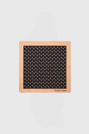 Peach square frame with a black patterned panel of repeating crescent motifs; 
