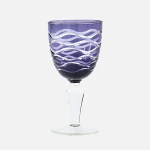 Purple glass goblet with a wavy clear swirl pattern and a clear stem.