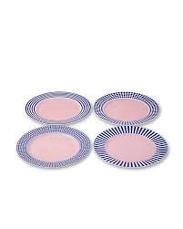 Four pink ceramic plates with blue striped rims arranged on a white surface.