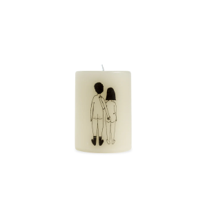 Beige candle with a black line drawing of two nude people standing side by side, holding hands, seen from behind