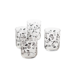 Four clear drinking glasses arranged together, each with a black abstract pattern of small silhouetted figures.
