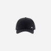 IMG_2181 - New Trend Dark gray baseball cap with a curved brim and a small metal logo plate on the side