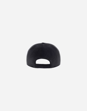 Rear view of a dark baseball cap with an adjustable back strap viewed from behind