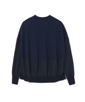 Back view of a navy blue oversized sweatshirt with a gathered ribbed hem and cuffs, loose fit.