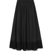 Black midi/maxi skirt with an elastic waistband and a pleated hem at the bottom.