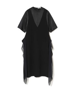 Black midi dress with sheer navy side panels and short puff sleeves, worn on a plain white background.