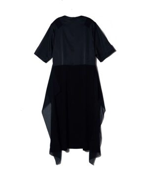 Black midi dress with short sleeves and a sheer, asymmetrical overlay creating a high-low hem in flowing fabric.