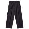 Front view of black wide-leg tailored trousers with belt loops and front pleats photographed against a white background.