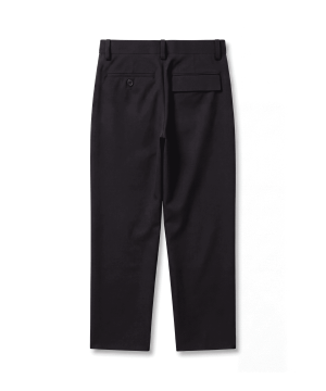 Back view of black dress pants showing a small buttoned welt pocket on the left and a rectangular flap pocket on the right