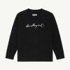 Black long-sleeve crewneck shirt with a white handwritten logo across the chest.