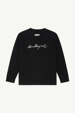 Black long-sleeve crewneck shirt with a white handwritten logo across the chest.