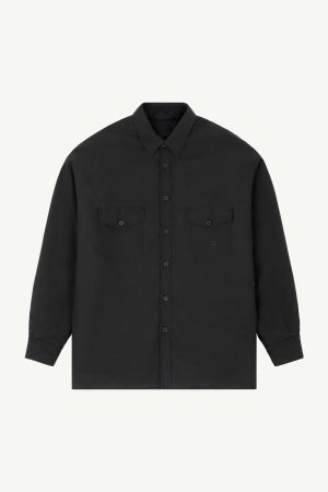 Dark charcoal button-down shirt with a fold-over collar and two front pockets on the chest, viewed from the torso up.