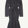 Dark gray dress with twisted knot detail at waist and long sleeves, patterned with small repeating text motif
