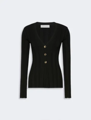 Black ribbed cardigan with V-neck and four gold buttons, long sleeves.
