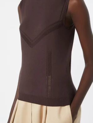Fitted brown sleeveless knit top with V-shaped perforated panels and ribbed hem, shown on a model