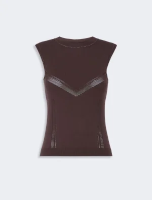 Brown sleeveless knit top with a chevron perforated stripe across the chest area for decorative detail.