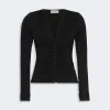 Black V-neck, long-sleeve ruched blouse with gathered center front and fitted silhouette.