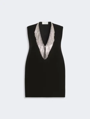 Black sleeveless mini dress with a silver beaded fringe V-neck embellishment at the front.