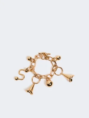 Gold charm bracelet with multiple dangling charms on a pale background, jewelry accessory image for product listing