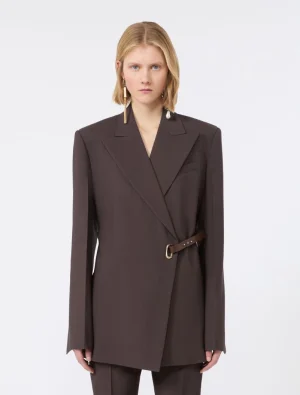 Brown wrap-style blazer with a matching belt and gold buckle on a female model.