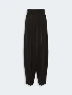 Black high-waisted, wide-leg tailored trousers with front pleats.