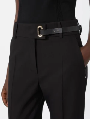 Black tailored pants with a black belt and gold buckle at the waist.