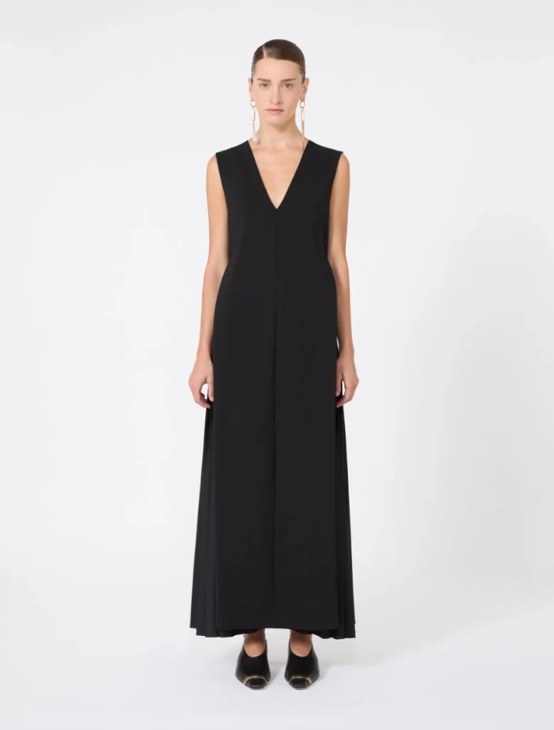 Black sleeveless V-neck maxi dress with wide-leg silhouette on a model.