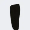IMG_3160 - New Trend Black draped one-shoulder dress with ruched detailing against a light background
