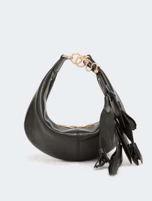 Black leather hobo bag with gold hardware and long tassel fringe on the side.