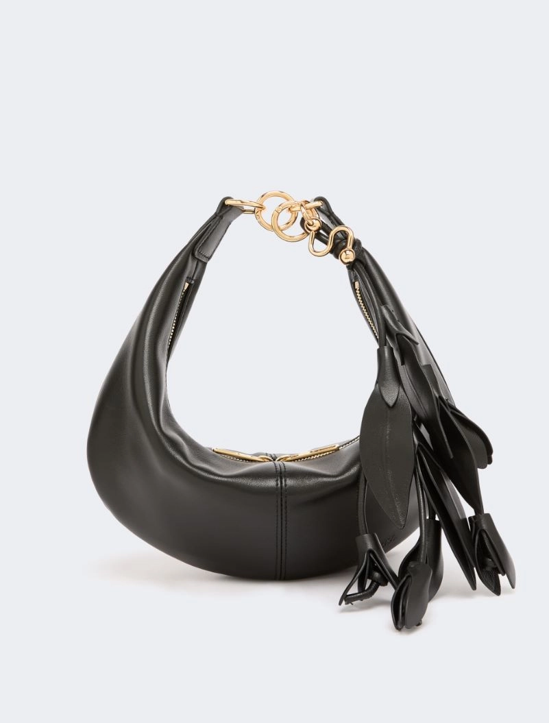 IMG_3165 - New Trend Black leather hobo bag with gold hardware and long tassel fringe on the side.