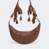 IMG_3169 - New Trend Brown crescent-shaped leather handbag with a knotted fringe strap and gold hardware.