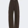 Brown cargo pants with a belt, straight wide legs and large side pockets, full-length.